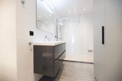 a bathroom with a sink and a shower at Mediterranean Cosy Studio in Cannes