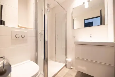 a bathroom with a shower and a toilet and a sink at French Dolce Vita near Croisette in Cannes