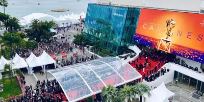 an overhead view of a crowd of people at an event at French Dolce Vita near Croisette in Cannes