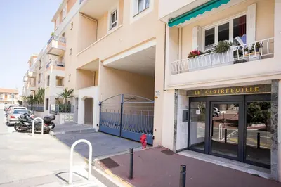 a building with a motorcycle parked in front of it at Perchoir - Balcon, vue sur la ville, Palais&Plages in Cannes