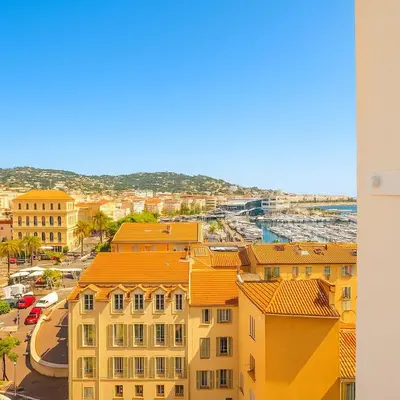 a view of a city with buildings and a harbor at Seaview Studio, Palais des Festivals in Cannes