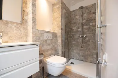 a bathroom with a toilet and a shower at Croisette Palais des Festivals Studio in Cannes