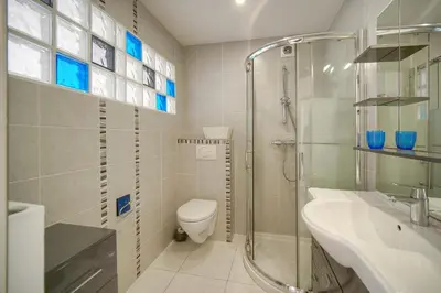 a bathroom with a shower and a toilet and a sink at Studio lumineux avec balcon A0B207 in Cannes