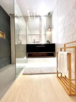 a bathroom with a shower and a sink at Studio La Baronne in Cannes
