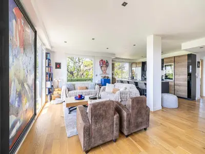 a living room with two couches and a table at Modern flat with sea view - AC- 2BR- 4P - Cannes in Cannes