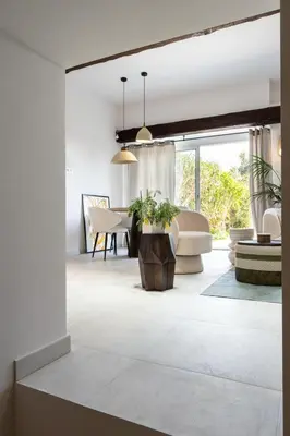 a living room with a couch and a table at Maison Azur-Townhouse Cannes Near Palais in Cannes