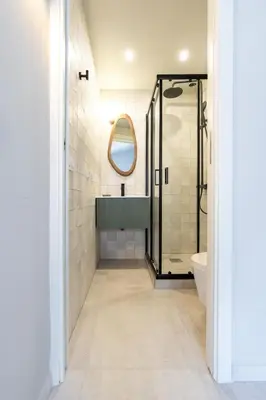 a bathroom with a sink and a shower at Maison Azur-Townhouse Cannes Near Palais in Cannes
