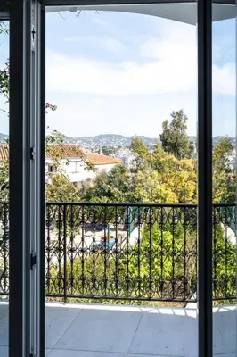 a view from the window of a balcony at Maison Azur-Townhouse Cannes Near Palais in Cannes