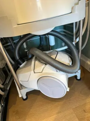 a vacuum under a desk with a sink at Shiny Sea View Flat vue merTerrace in Cannes in Cannes
