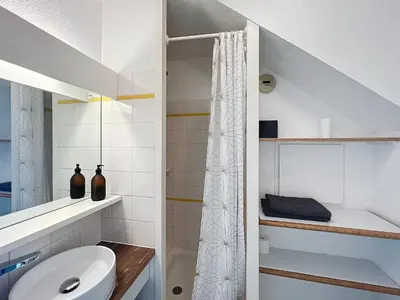 a bathroom with a toilet and a sink at Appartement Cannes vue sur mer in Cannes