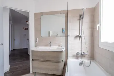 a bathroom with a sink and a shower at LE MADRID avec balcon proche Croisette plages et Palais des Festivals in Cannes