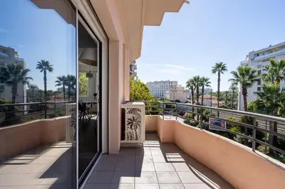 a balcony with a view of a city at LE MADRID avec balcon proche Croisette plages et Palais des Festivals in Cannes