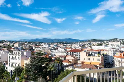 a view of a city from a balcony at L'HORIZON avec somptueuse terrasse vue mer in Cannes