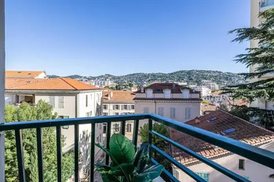 a view of a city from a balcony at LA PALMERAIE joyeux studio avec balcon, à deux pas de la Banane in Cannes