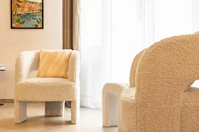 two chairs sitting next to each other in a room at Elégant et moderne T4 à 100M de La Croisette in Cannes