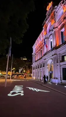 a building with lights on the side of a street at Cannes Center, minutes walk from the Palais des festivals, Beaches, La Croisette and Rue d'Antibes in Cannes
