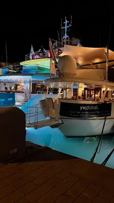 a large boat is docked in the water at night at Cannes Center, minutes walk from the Palais des festivals, Beaches, La Croisette and Rue d'Antibes in Cannes