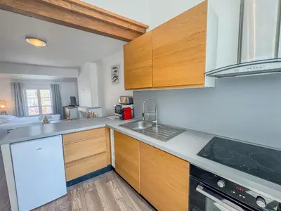 a kitchen with a sink and a stove at WOOD Forville Suquet View in Cannes