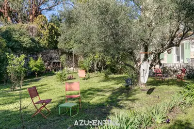 a walkway next to a yellow building at Azurenting - Bastide Alba - Studio - Terrasse in Cannes