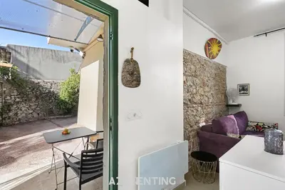 a bathroom with a sink and a mirror at Azurenting - Bastide Alba - Studio - Terrasse in Cannes