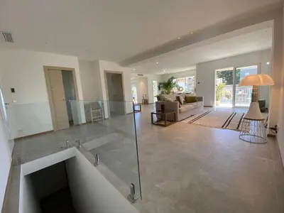 a large living room with a view of the living room at 4 bedroom house Le Cannet in Le Cannet