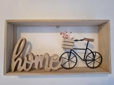 a framed picture of a bike with a basket at Appartement entier cosy au calme in Le Cannet