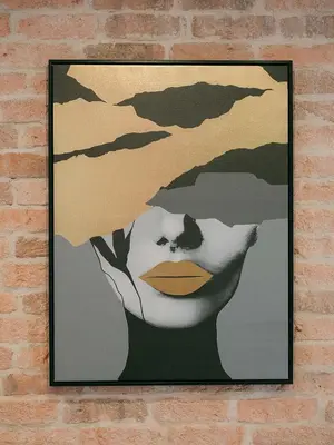 a painting of a woman with a cat on her head at La Casa du Suquet, zone piétonne in Cannes