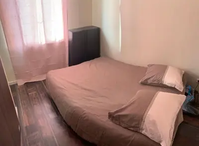 a small bed in a bedroom with a window at La Terrasse 4 Cannes French Riviera in Cannes