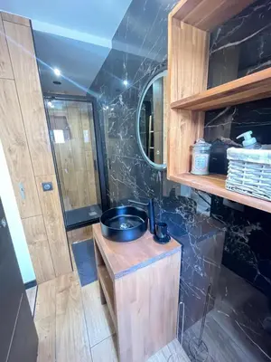 a small kitchen with a sink and a counter at T2 avec terrasse 4p, Cannes centre in Cannes