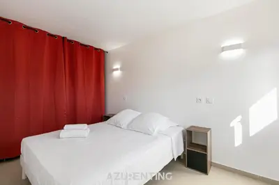 a kitchen with a table and chairs in a room at Azurenting - Bastide Mira - 1 chambre - Balcon in Cannes