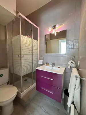 a bathroom with a sink and a shower and a toilet at Foch 1 - Luminous apartment in city center w balcony in Cannes