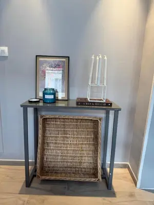 a table with a wicker basket and candles on it at Foch 1 - Luminous apartment in city center w balcony in Cannes