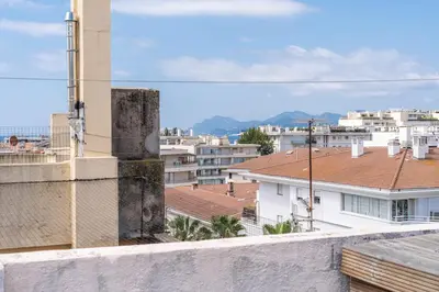 a patio with chairs and a pool on a roof at Studio Love Room Rooftop Jacuzzi SCLS Rentals in Cannes