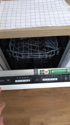 an oven with its door open with aasser at Beachfront 4 people 2 swimming pool in Cannes
