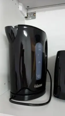 a black toaster sitting on top of a counter at Beachfront 4 people 2 swimming pool in Cannes