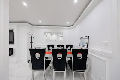 a dining room with a table and chairs at Cannes 3 bedrooms apartment - 14HV in Cannes
