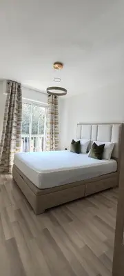 a bedroom with a large bed in a room at T2 chic non loin de palais festival in Cannes