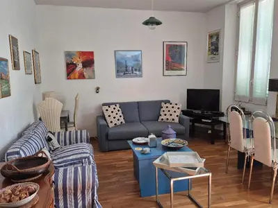 a living room with a couch and a table at Terrasse Bergerie in Cannes