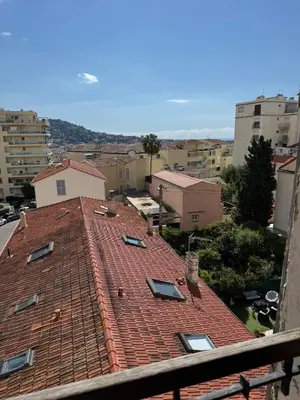 a view of a red tile roof of a city at Studio Cannes, near Croisette in Cannes
