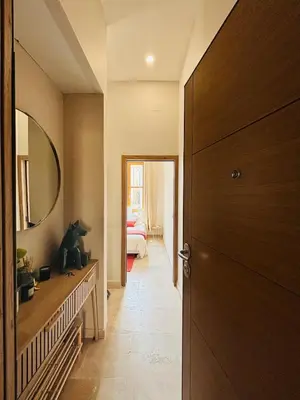 a hallway with a door leading to a bedroom at Le Sainte Rose Standing, Cannes center on foot in Cannes