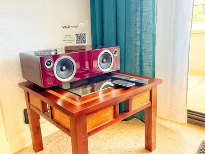a radio sitting on top of a wooden table at Cannes Breeze in Cannes