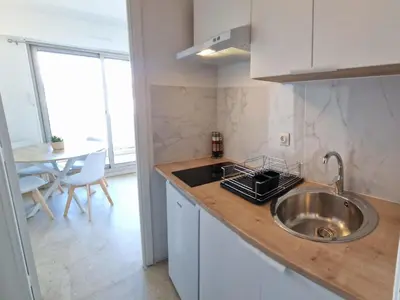 a kitchen with a sink and a counter top at Studio Le Floriana-2 by Interhome in Cannes