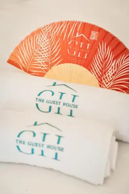 a hotel room with a tray of food on a bed at Suite L Ecrin Élégance confort au cœur de Cannes in Cannes