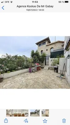 a screenshot of a picture of a patio with a house at villa matama in Cannes