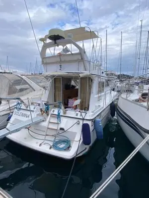 a group of boats docked in the water at une place au soleil in Cannes