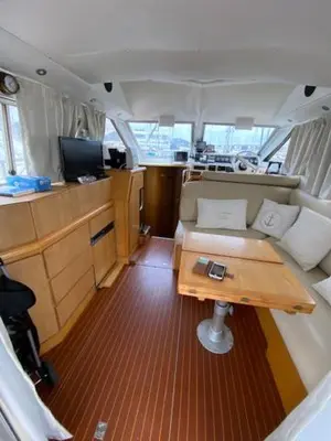 a view of the inside of a boat with a table at une place au soleil in Cannes