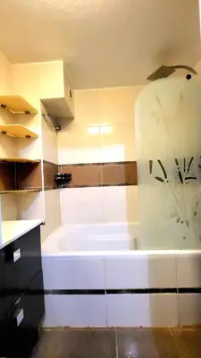 a bathroom with a shower and a sink at Beachfront 4 - 6 people 2 swimming pool in Cannes