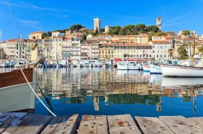 a view of a harbor with boats in the water at Beachfront 4 - 6 people 2 swimming pool in Cannes