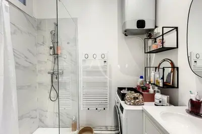 a bathroom with a shower and a sink at Le Barocco - Calm - Hypercentre - Cosy in Cannes