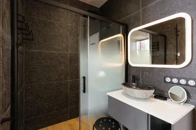 a bathroom with a sink and a shower at RARE-Superbe appt Suquet, jardin,6p,200m Croisette in Cannes